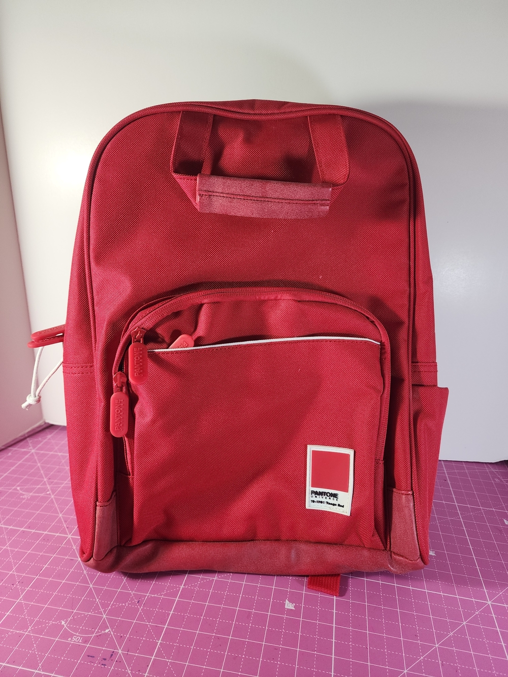 Redland London Tango Red Backpack. Pantone Universe